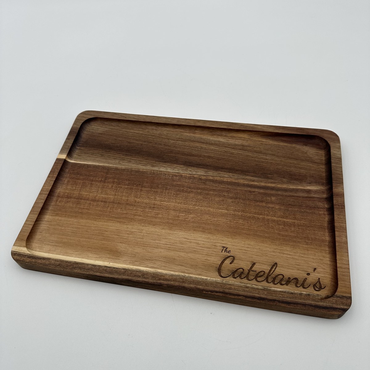 Acacia last name cutting board view 2