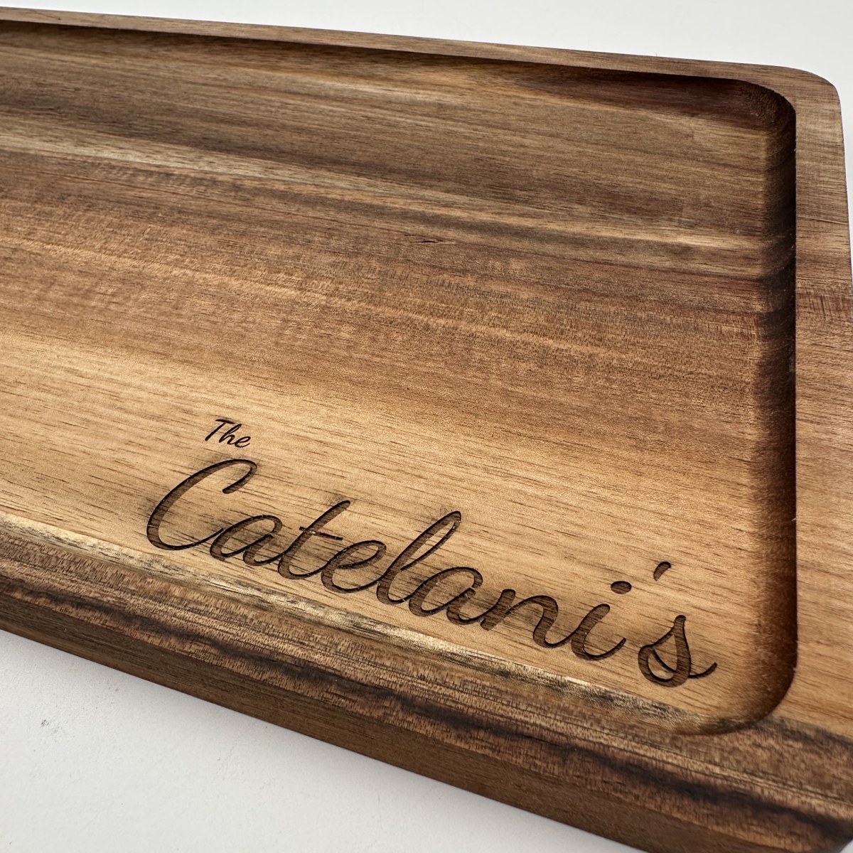 Acacia last name cutting board view 3