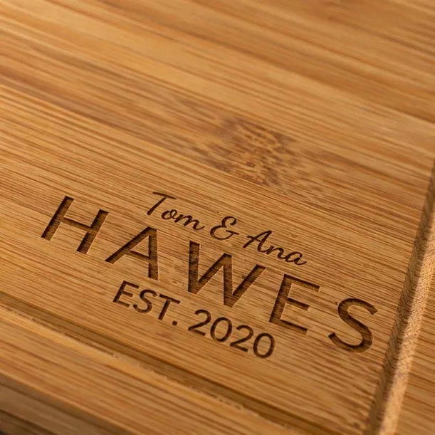 A bamboo board engraved with the couple's new shared surname