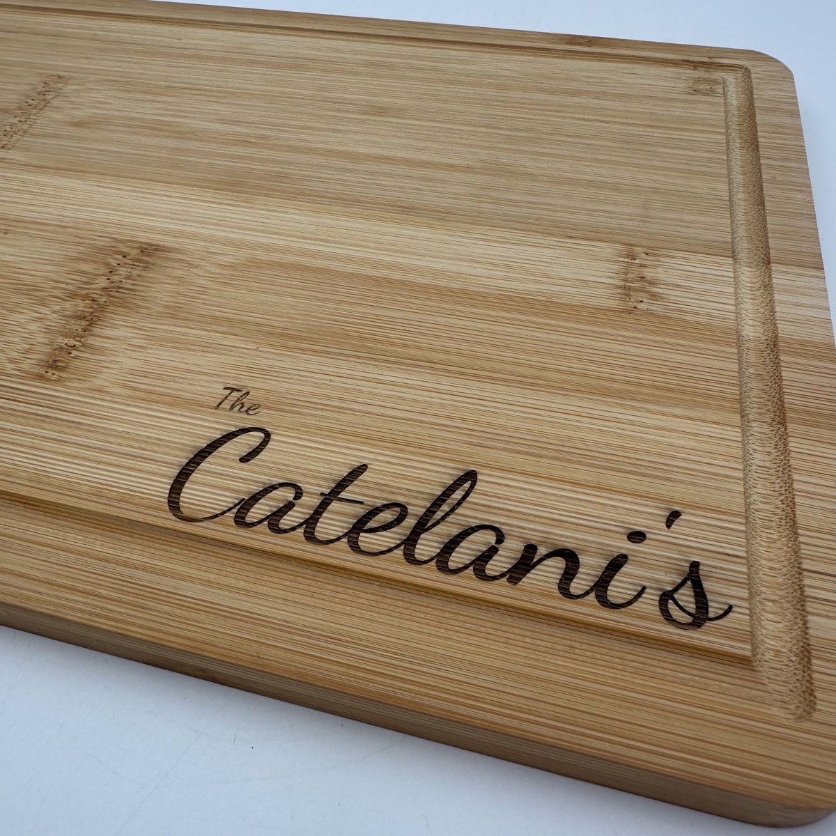 Bamboo last name cutting board view 3